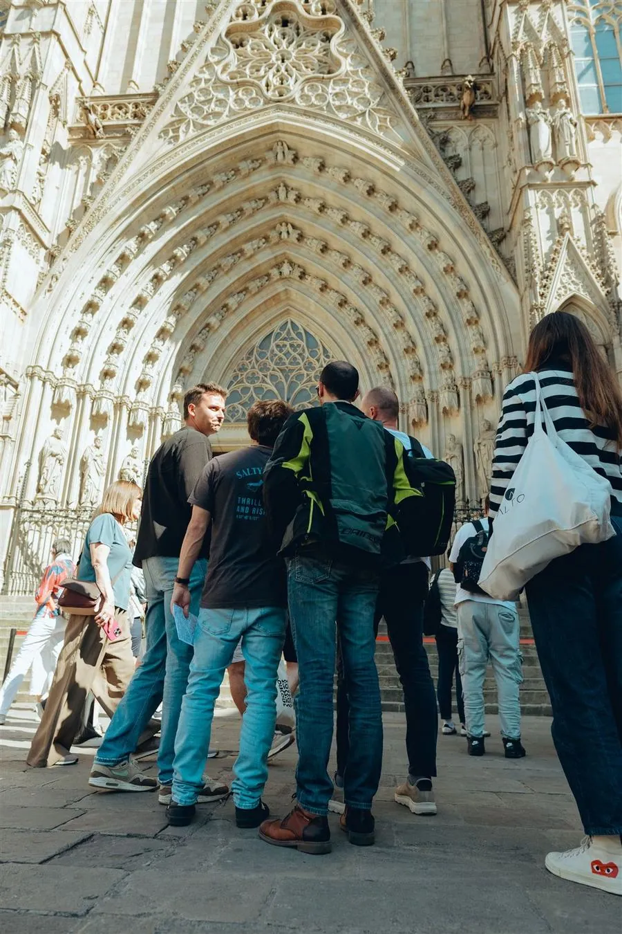 Colleagues cheering at the Cathedral entrance