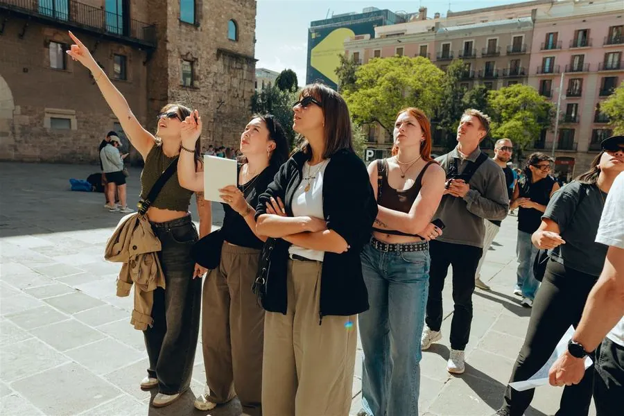 A team looking up together, working out a clue