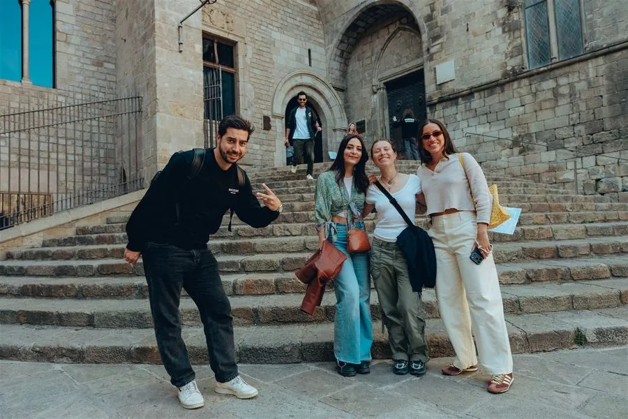 A team gathered together on the Cathedral steps
