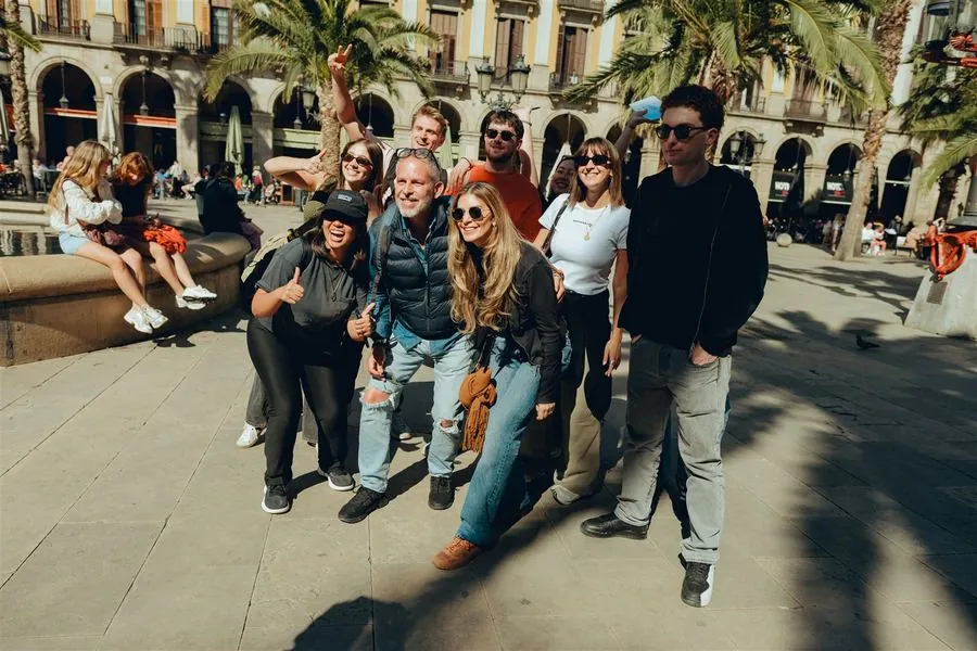A team posing in front of Barcelona Cathedral