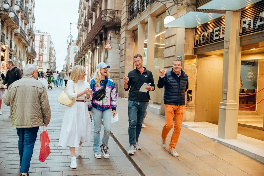 A team strolling through Barcelona in the evening light